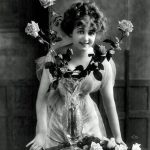 woman-with-flowers-1918