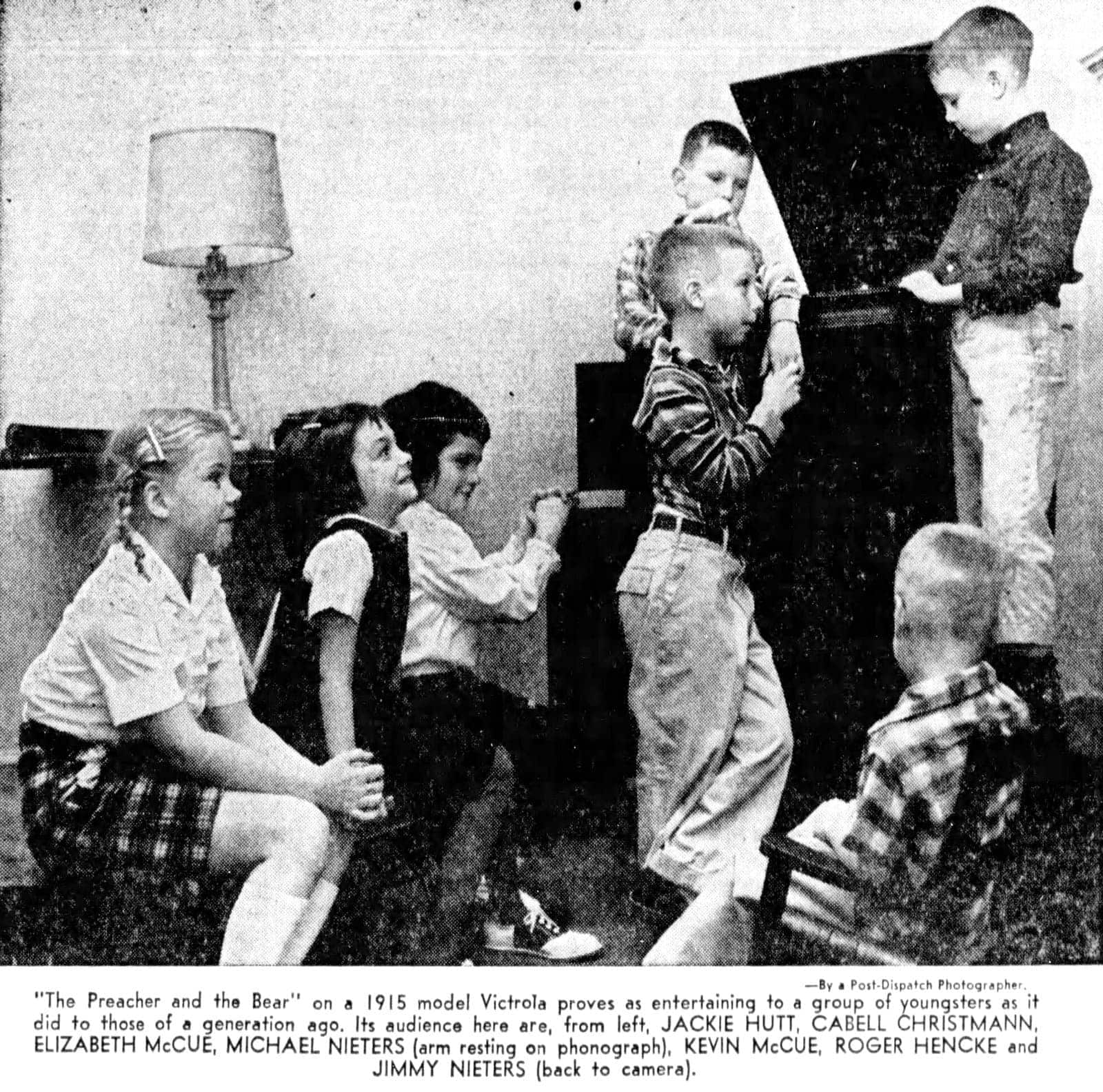 V is for Victrola: The famous record player that turned a brand name into a household word in 1906 14 1950s kids listening to an old Victrola