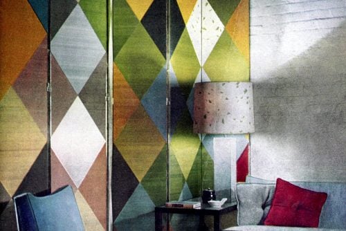 50s living room got flair from a colorful diamond-patterned screen divider