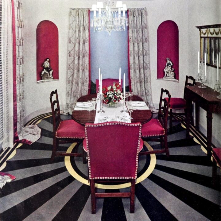 A beautifully dramatic 1930s dining room with a starburst-pattern floor