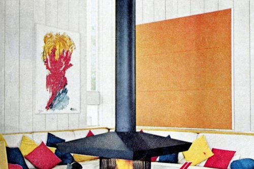 A freestanding fireplace was the center of this comfy retro living room