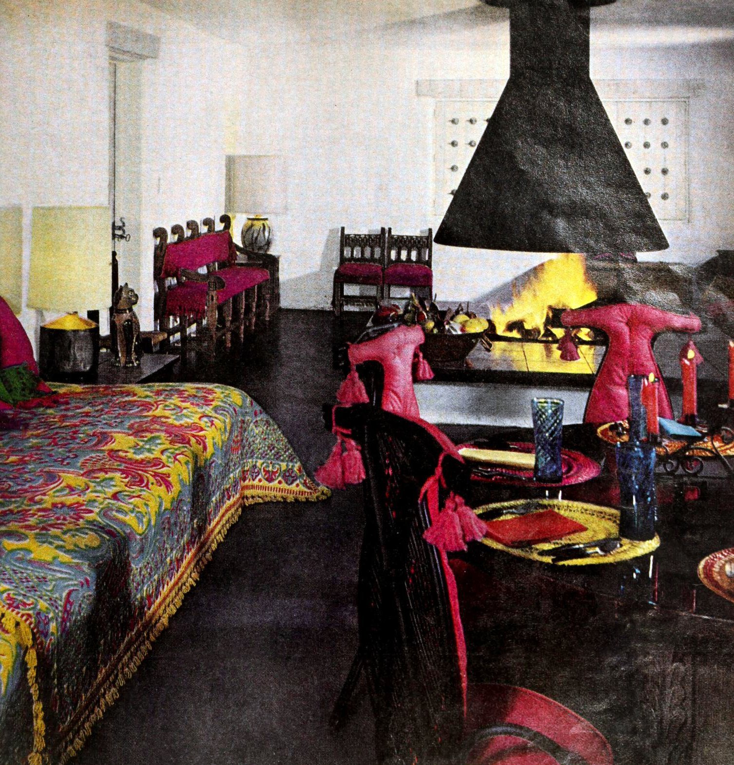 Stylish retro prefab fireplaces brought modern comfort to mid-century homes 14 Black hooded fireplace in a boho living room (1962) via ClickAmericana com