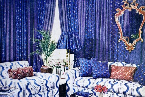 Blue fabric draped party-friendly family room (1970s)