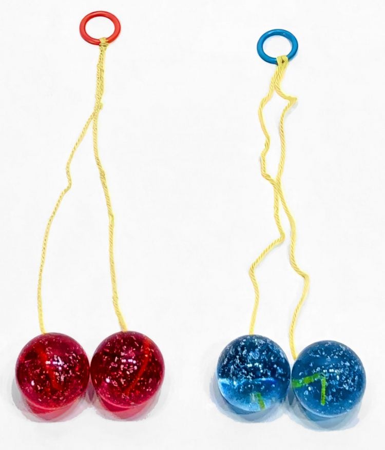 Remember clackers the toy with hard plastic balls on strings? Click