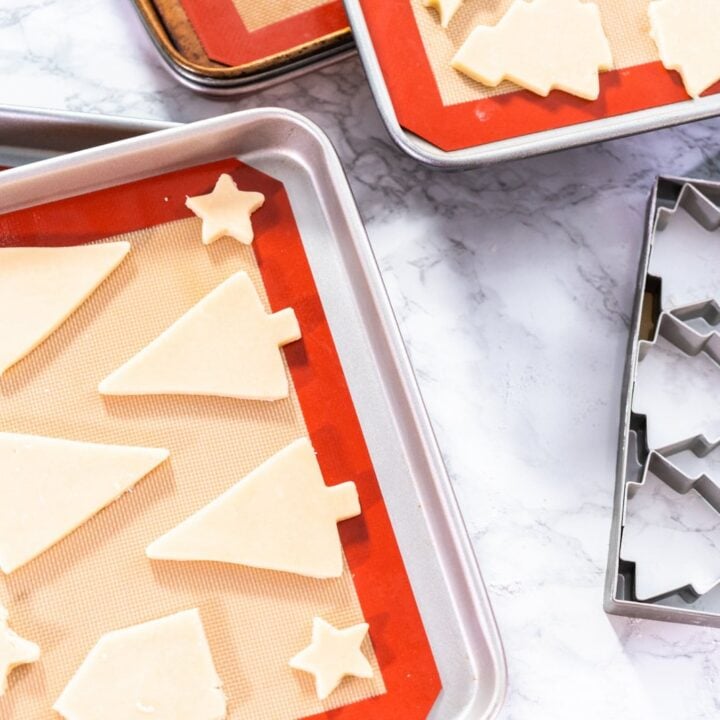 Cut-out sugar cookies on a baking sheet