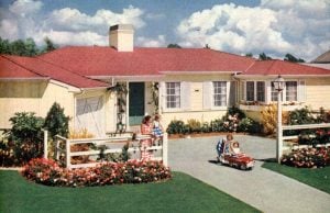 1950s small town: Cute house from the 1950s with kids playing in front