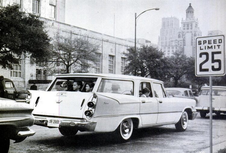 See some huge classic 50s station wagons, with fins & rearfacing back