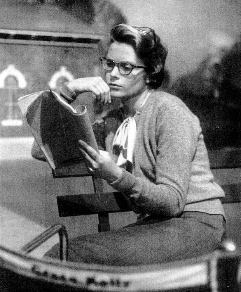 Grace Kelly in glasses Apr 26, 1954
