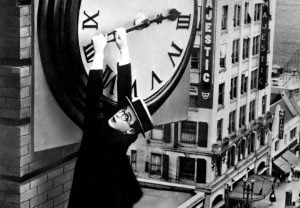 Harold Lloyd Safety Last hanging from the clock