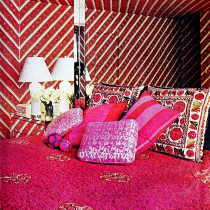 Patterns and fabric textures made this pink and red 70s bedroom peppery hot