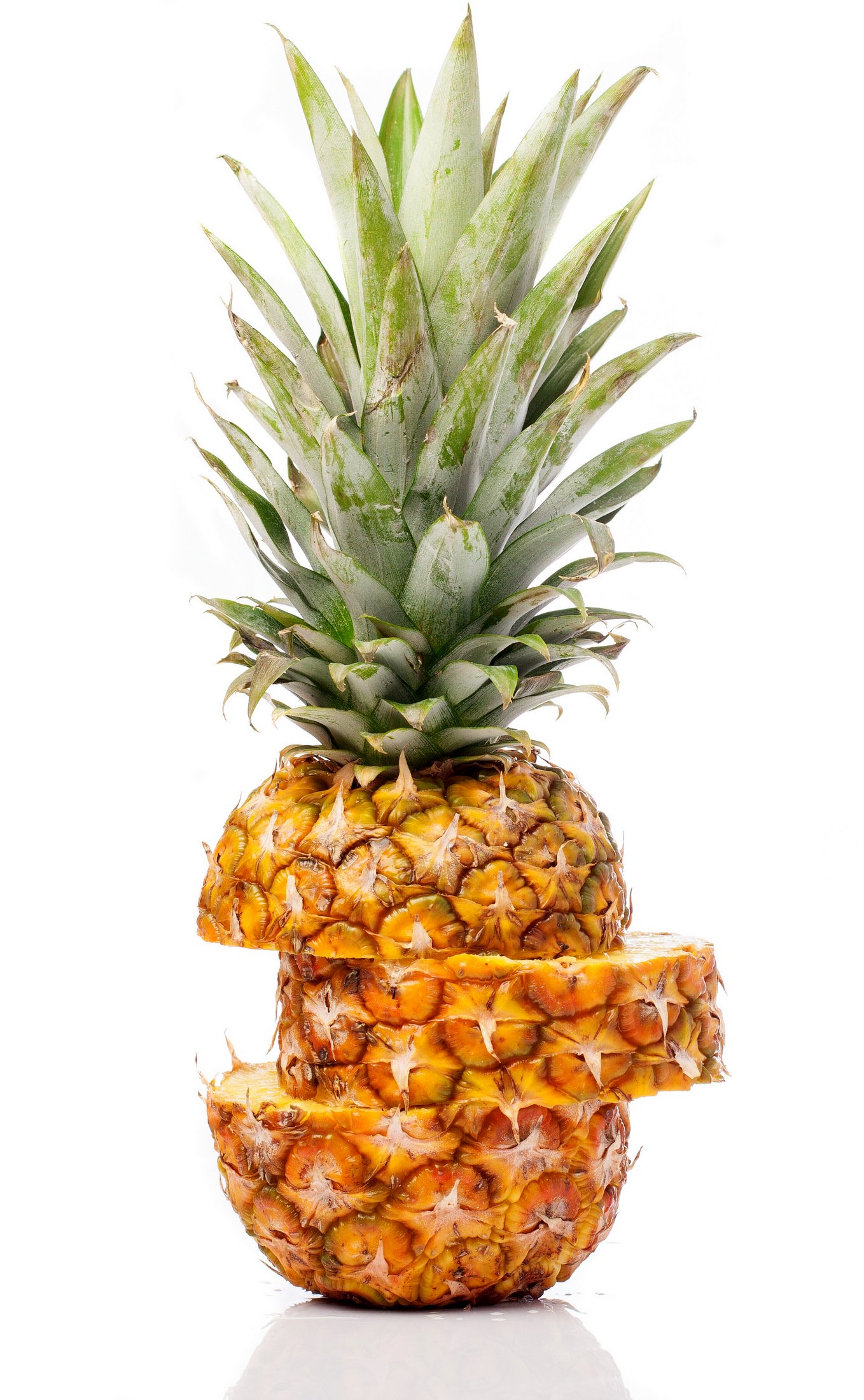 Ripe pineapple sliced across
