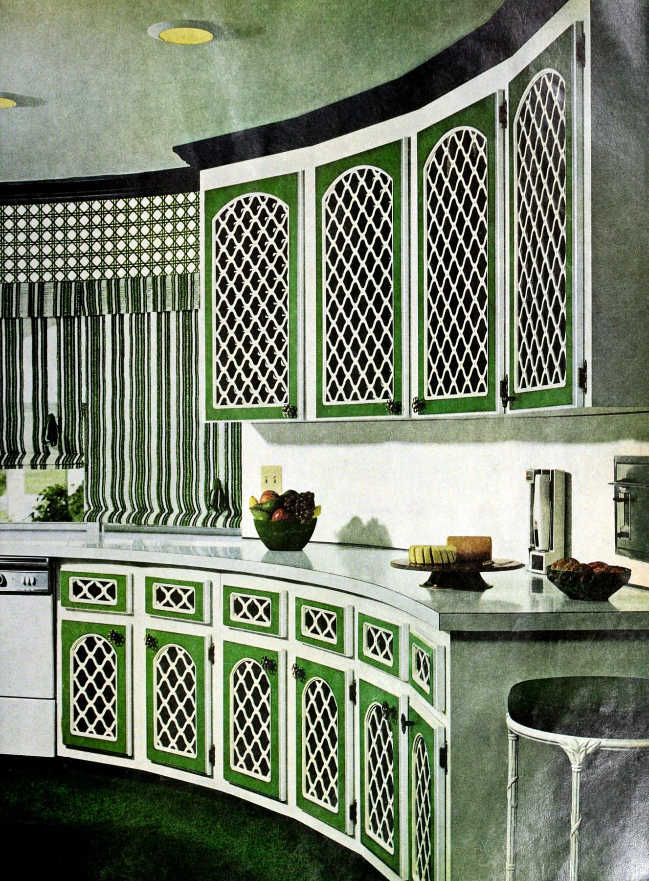 Swappable cabinet decor helped give this kitchen a fresh, outdoor look (1969)