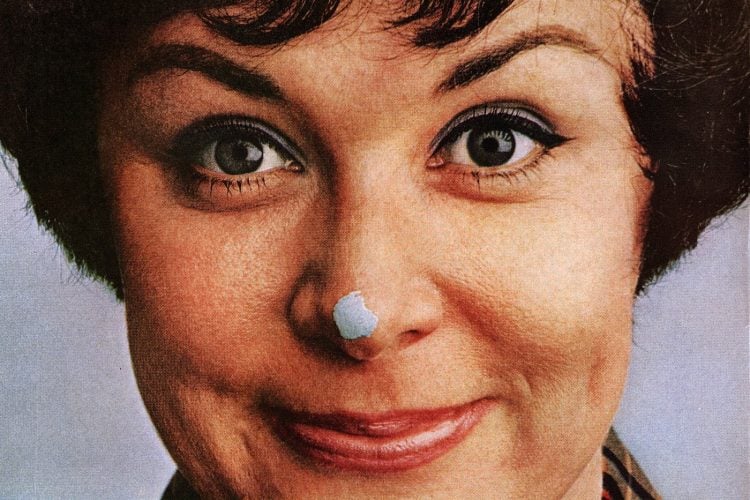 Woman with paint on her nose from the 1970s